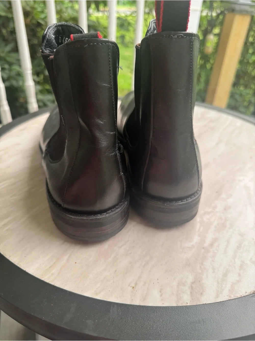 Allen Edmonds Black Leather Nomad Chelsea Boots with Red Heel Pull